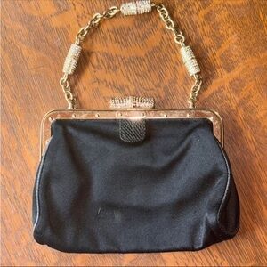 GUCCI Elegant Black and Gold Handbag with rhinestone accents